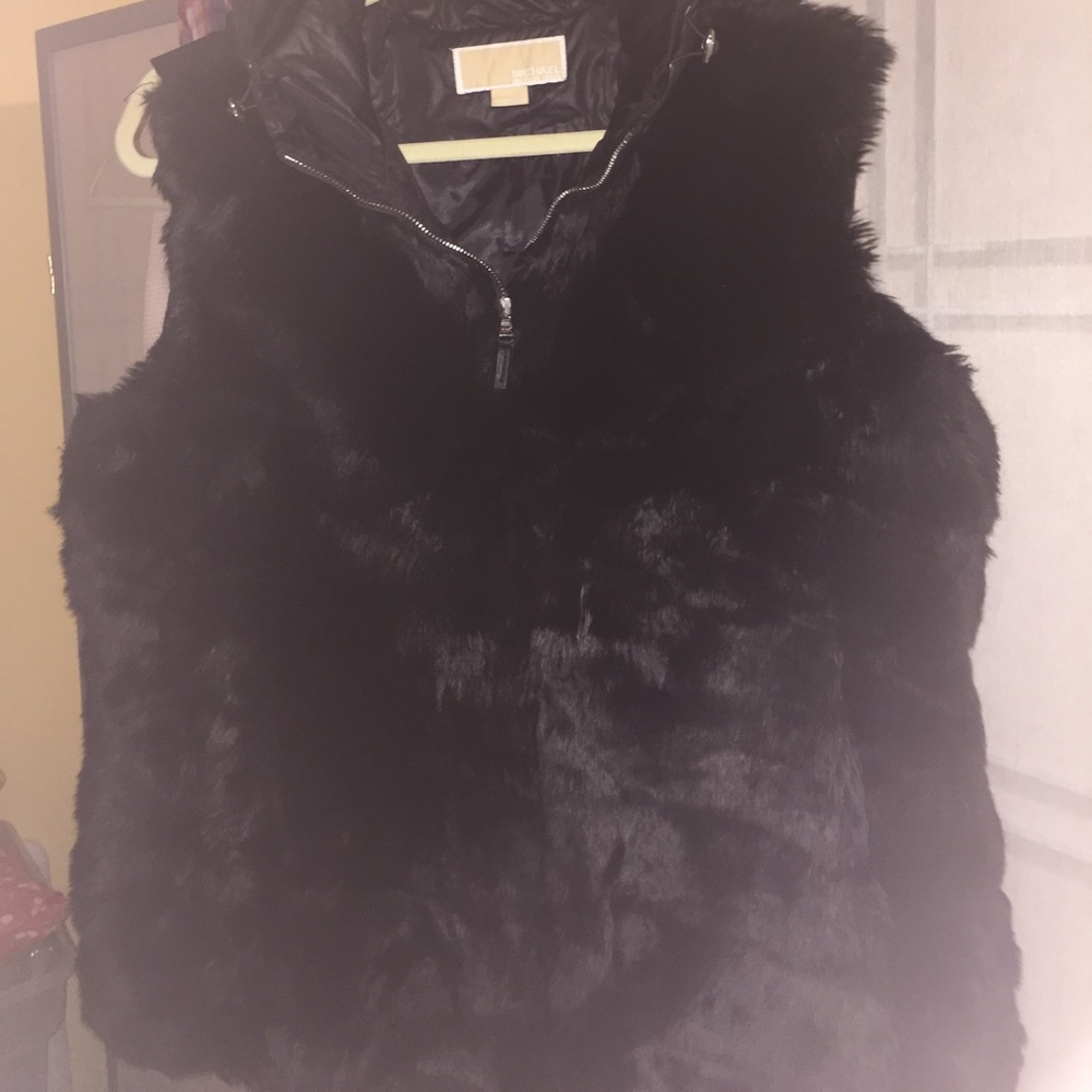 Michael Kors jacket and blouse.